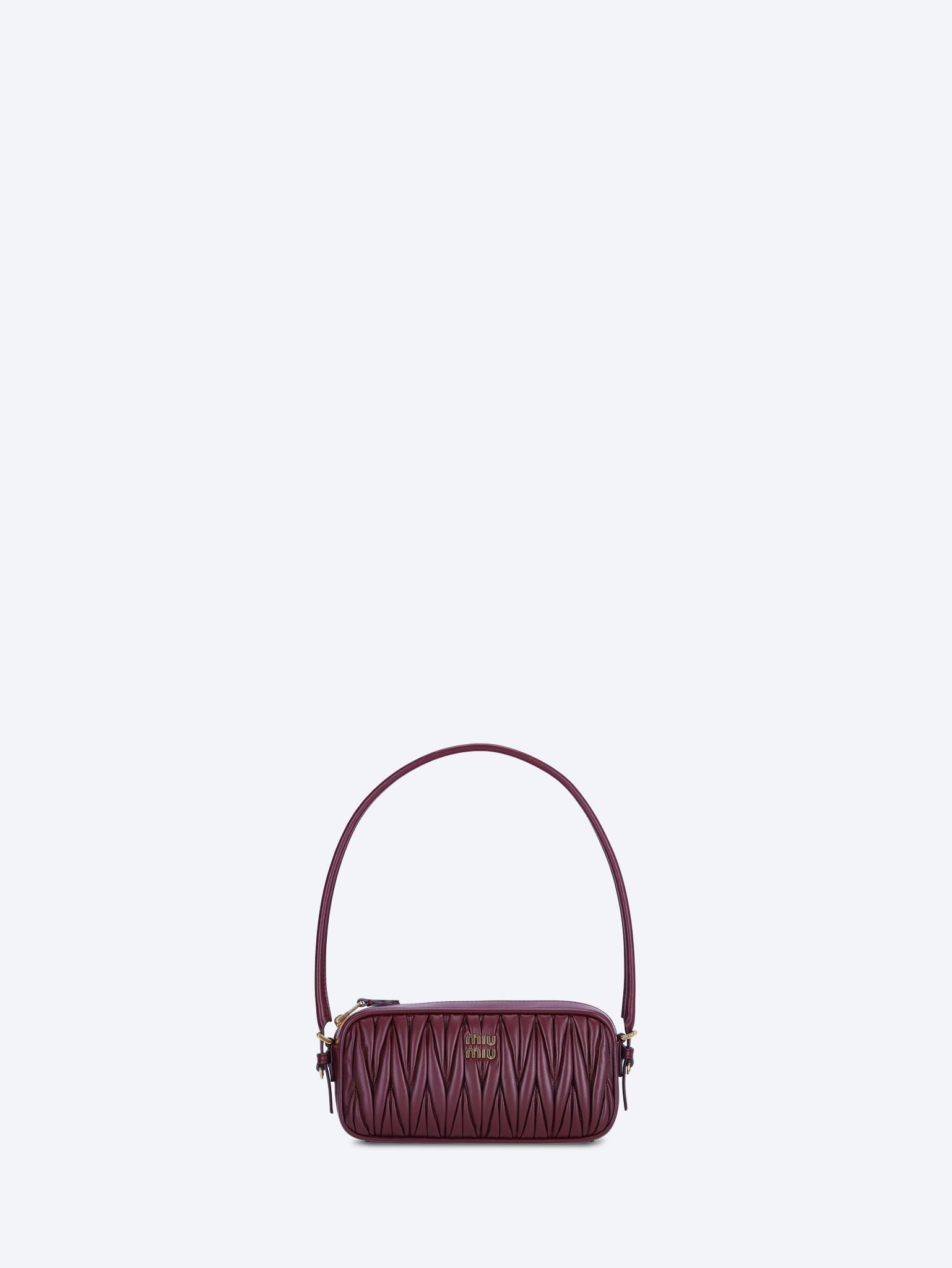 Leather matelasse handbag 1