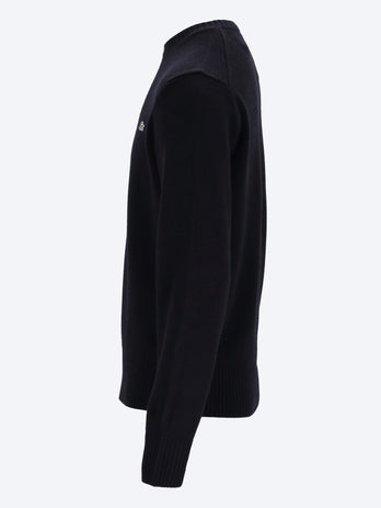 Pull à tége de laine cardée