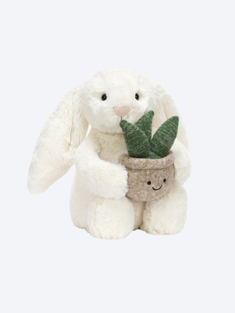 Cream bunny with plant 1