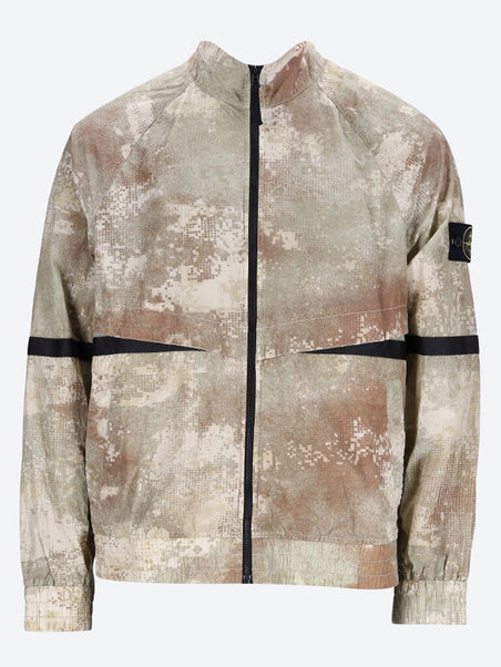 Dissolving grid camo jacket