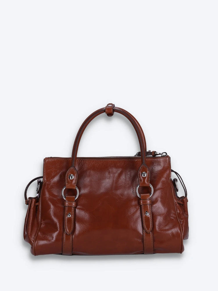 Handtasche aus glänzendem Leder 4